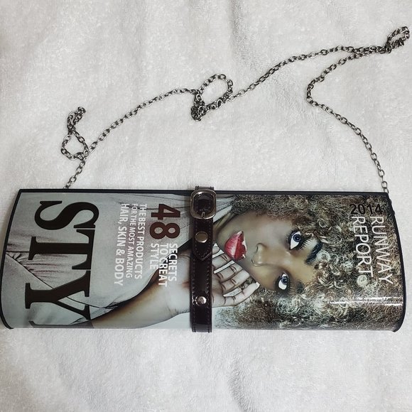 Handbags - Folded, glossy magazine clutch.